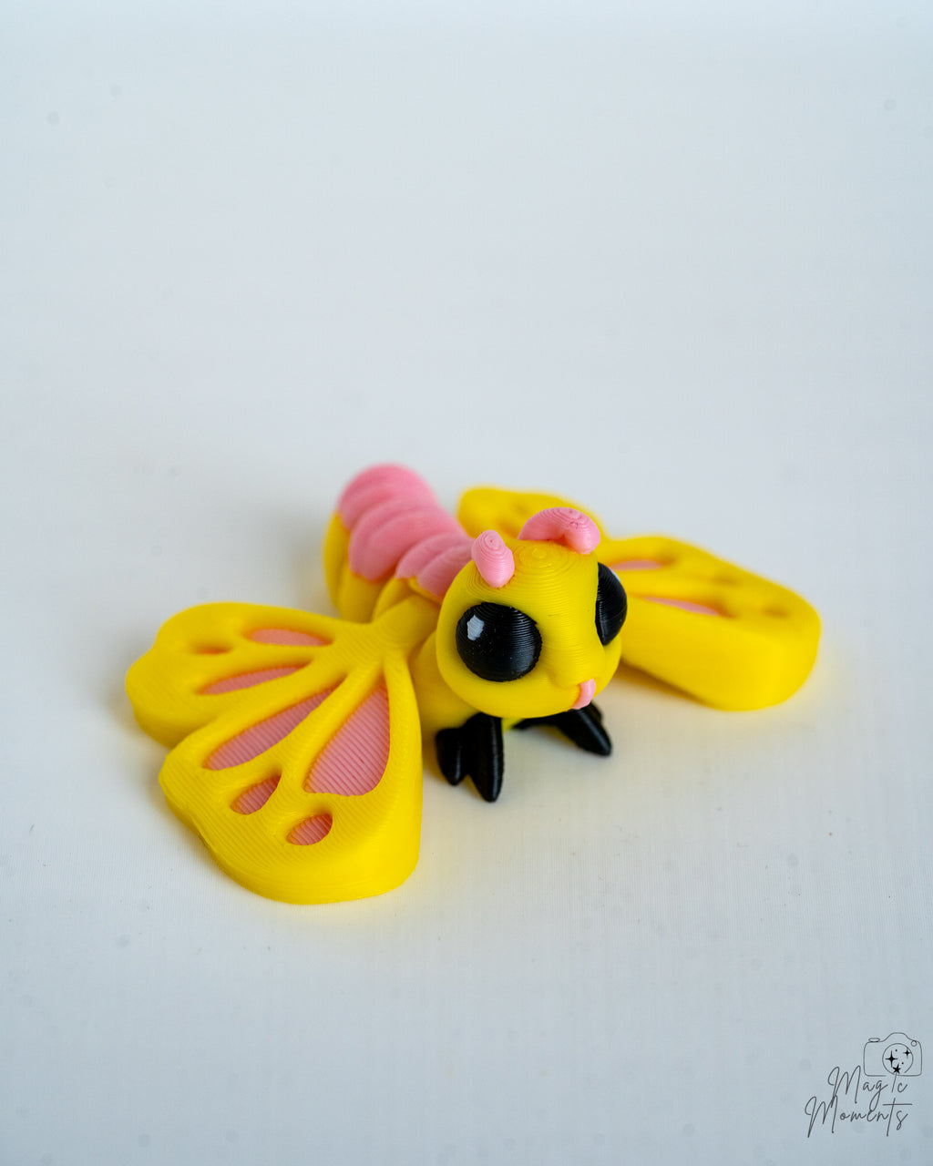 Pastel butterfly decorative figure viewed from side