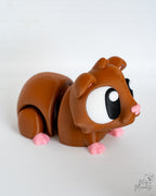 Mini guinea pig decorative figure viewed from side