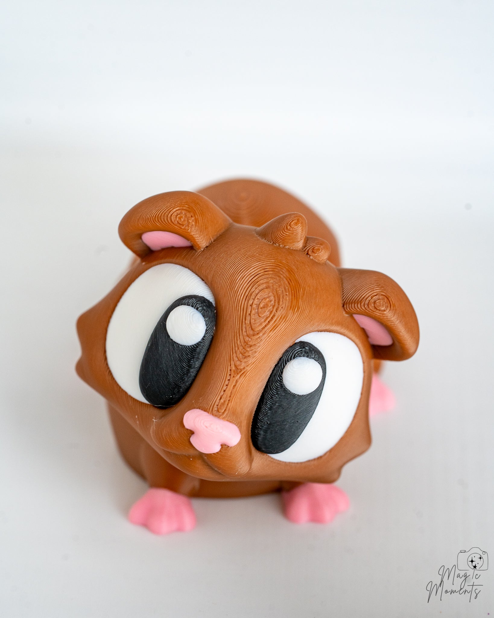 Cute guinea pig figure with large cartoon eyes