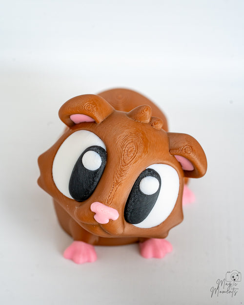 Cute guinea pig figure with large cartoon eyes