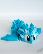 Mini crystal dragon with cartoon style eyes