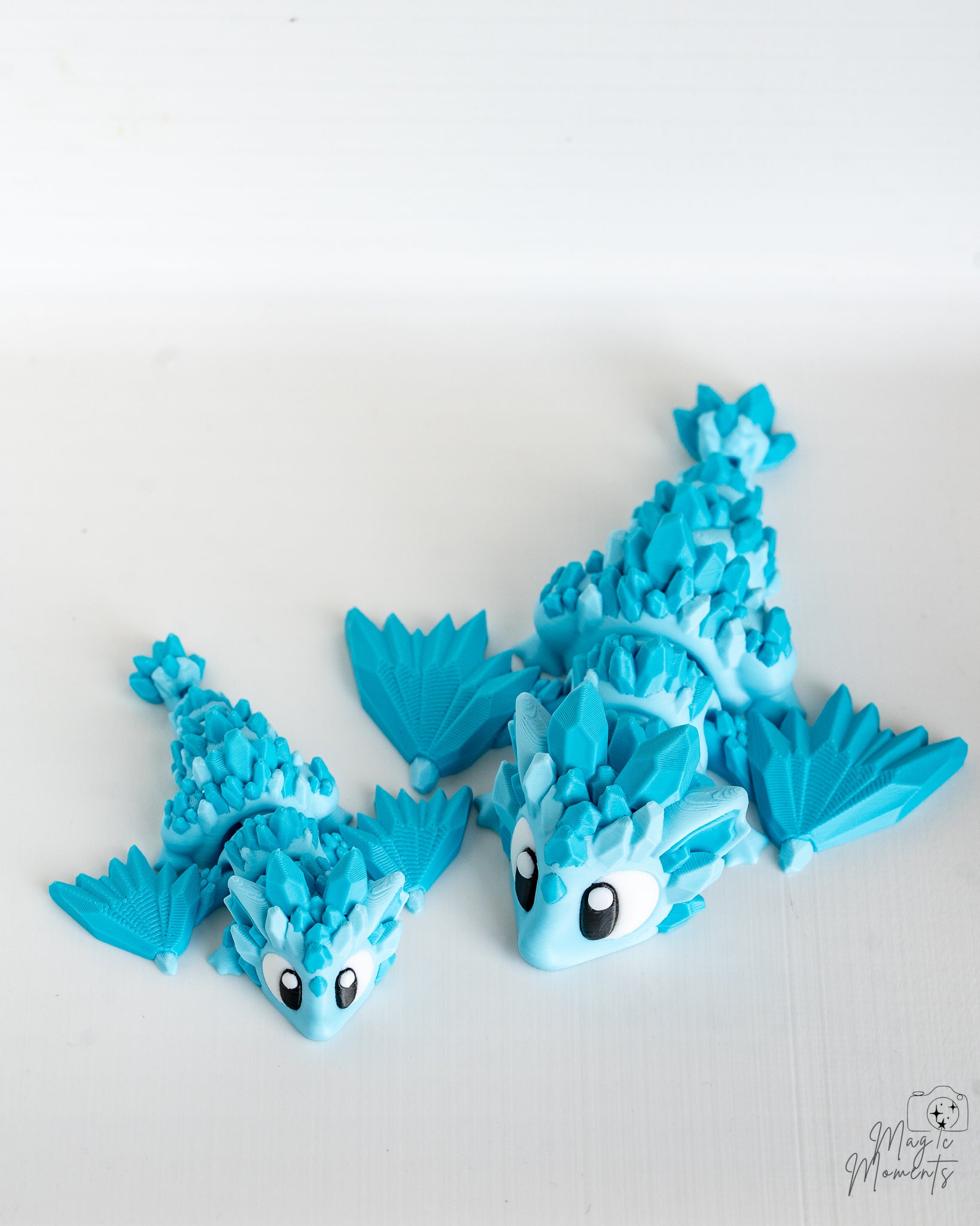 Blue crystal dragon figures displayed together