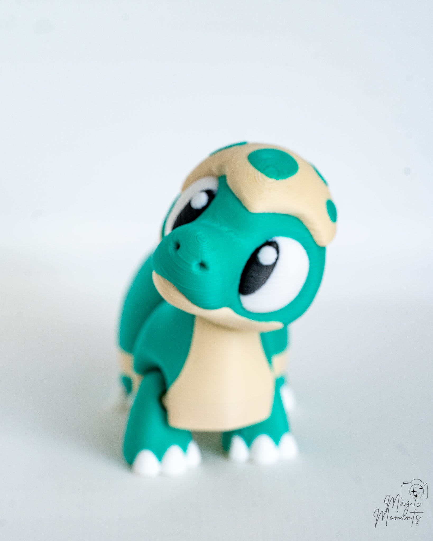 Mini dinosaur decorations with large cartoon eyes