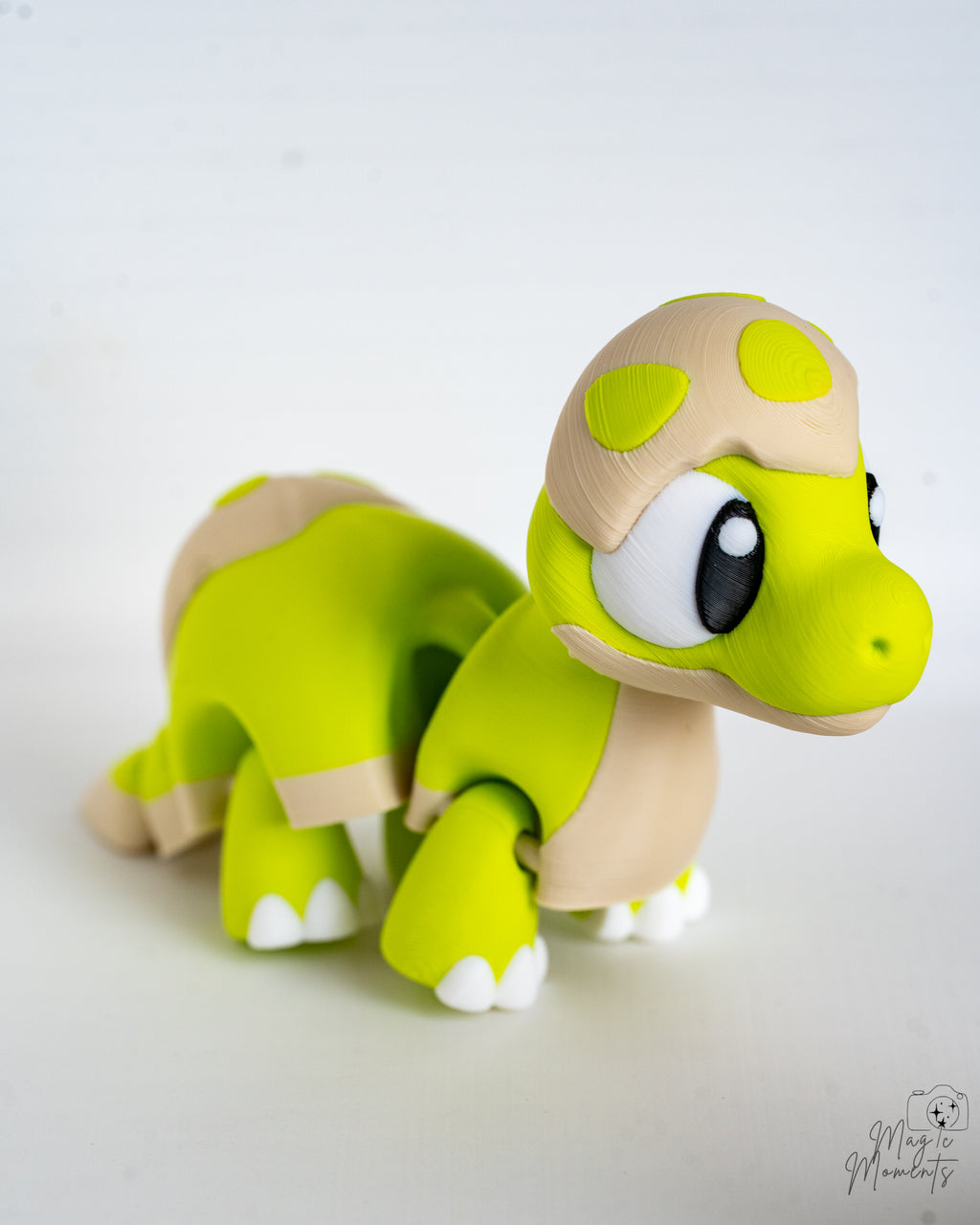 Cute articulated dinosaur figure viewed from side