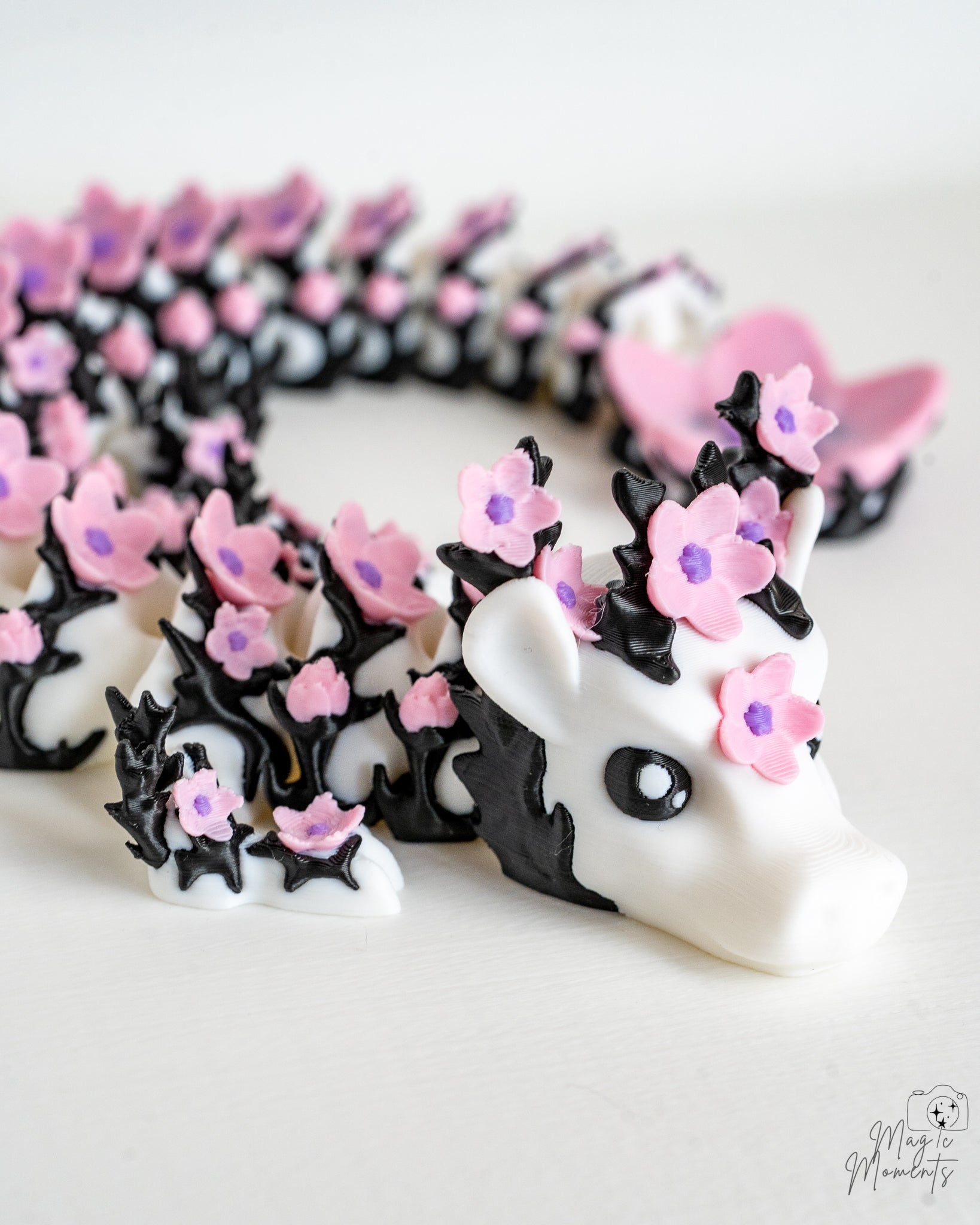 Cherry blossom dragon with articulated flexible body