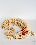 Bone dragon fantasy figure with metallic horns