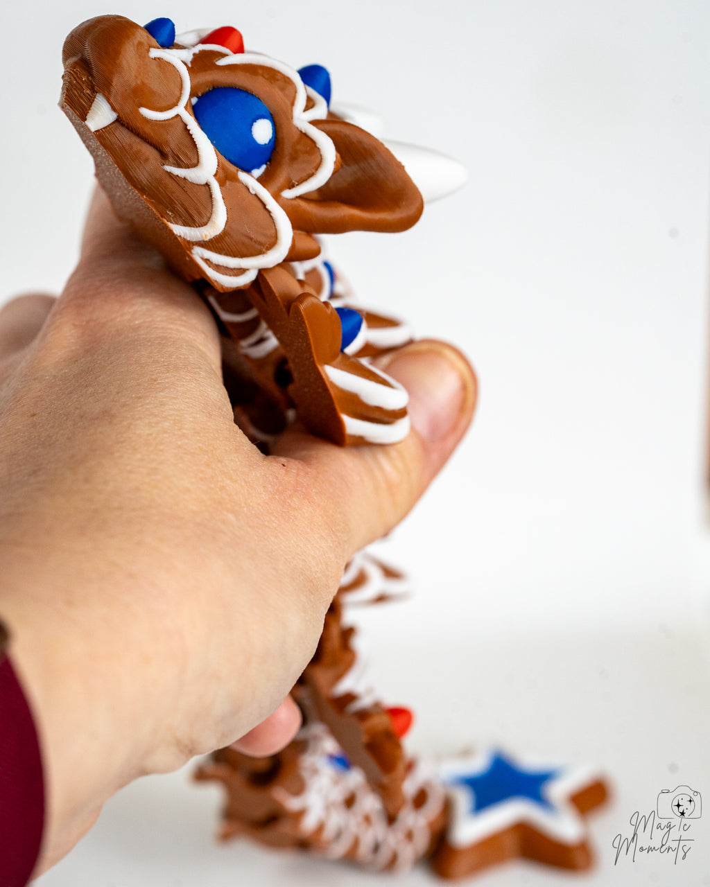 flexible gingerbread dragon with star details 3d printed figure