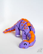Cute articulated dinosaur in purple and orange colours