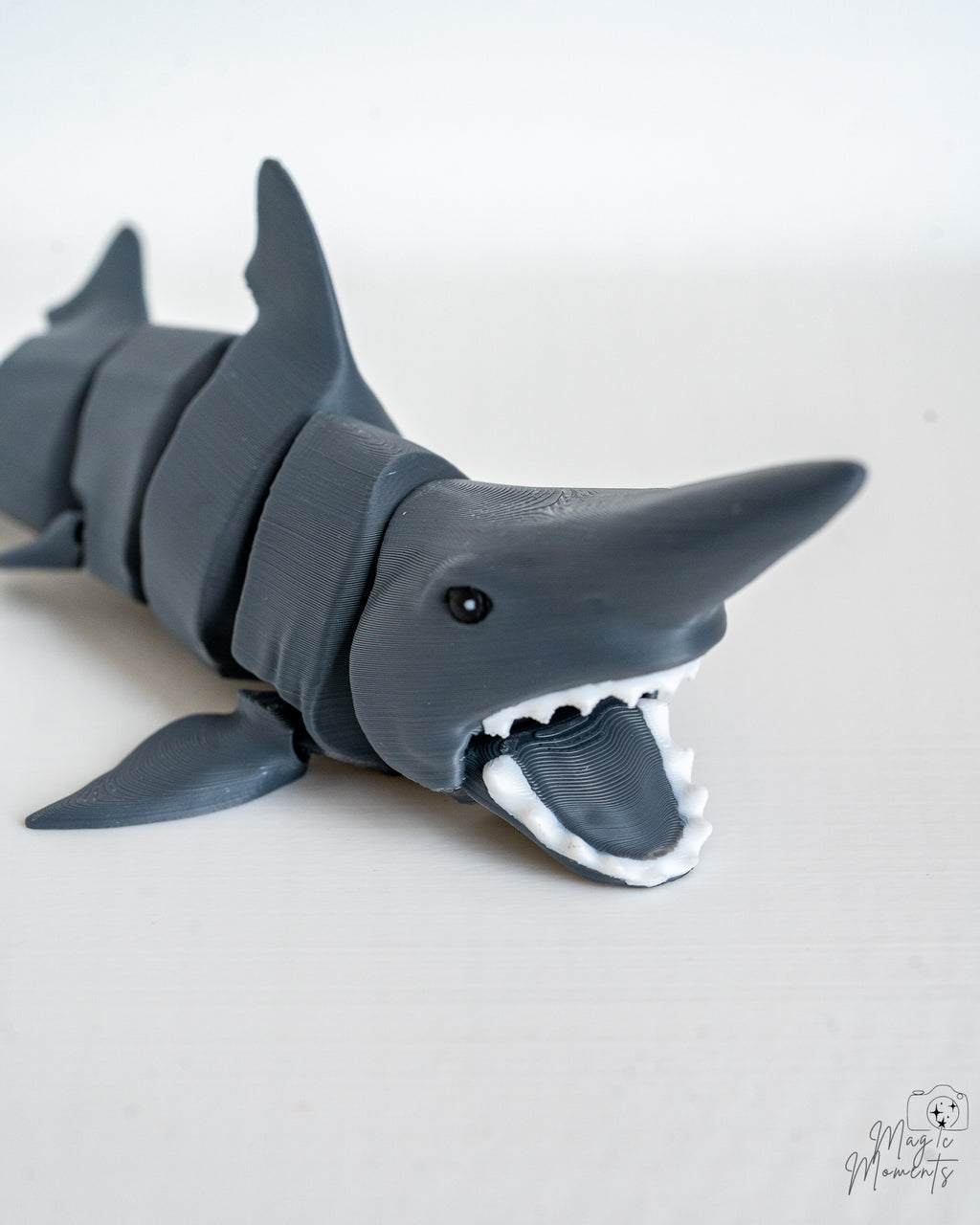 Flexible shark figure with detailed open mouth and articulated body