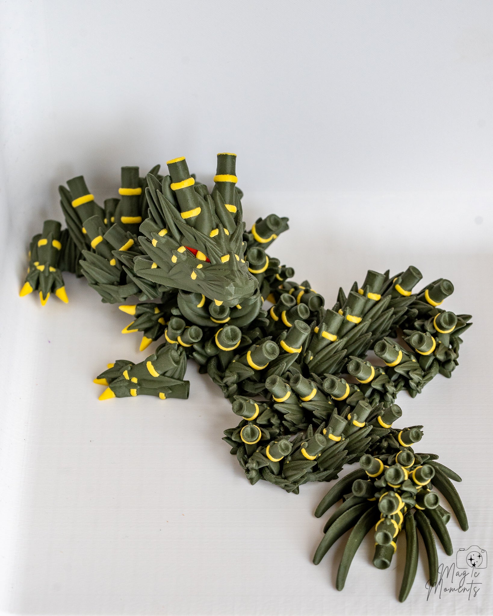 Articulated bamboo dragon figure with detailed fantasy design