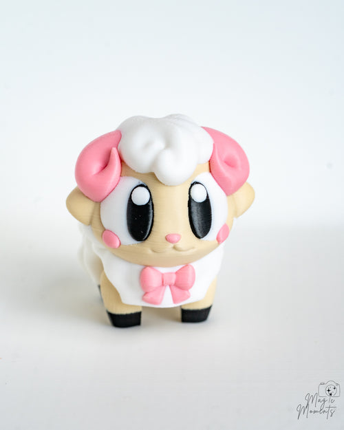 Cute sheep figure with pink bow