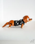 Cute sausage dog figure viewed from side