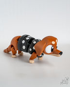 Articulated dachshund in black polka dot sweater