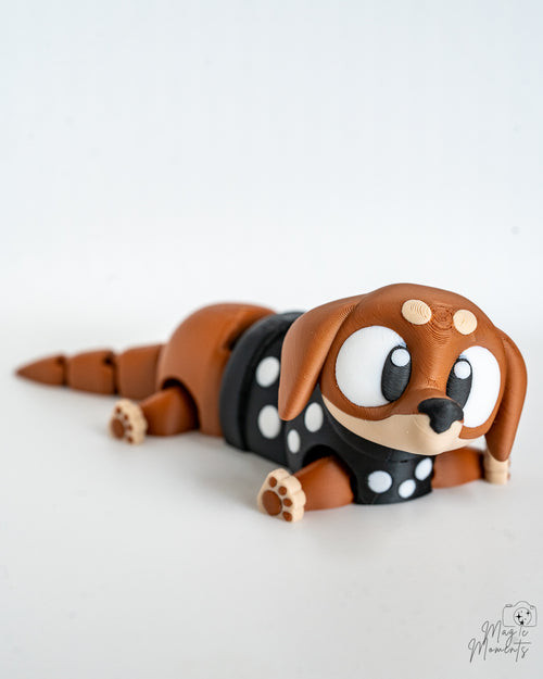 Mini sausage dog decorative figure with cartoon eyes