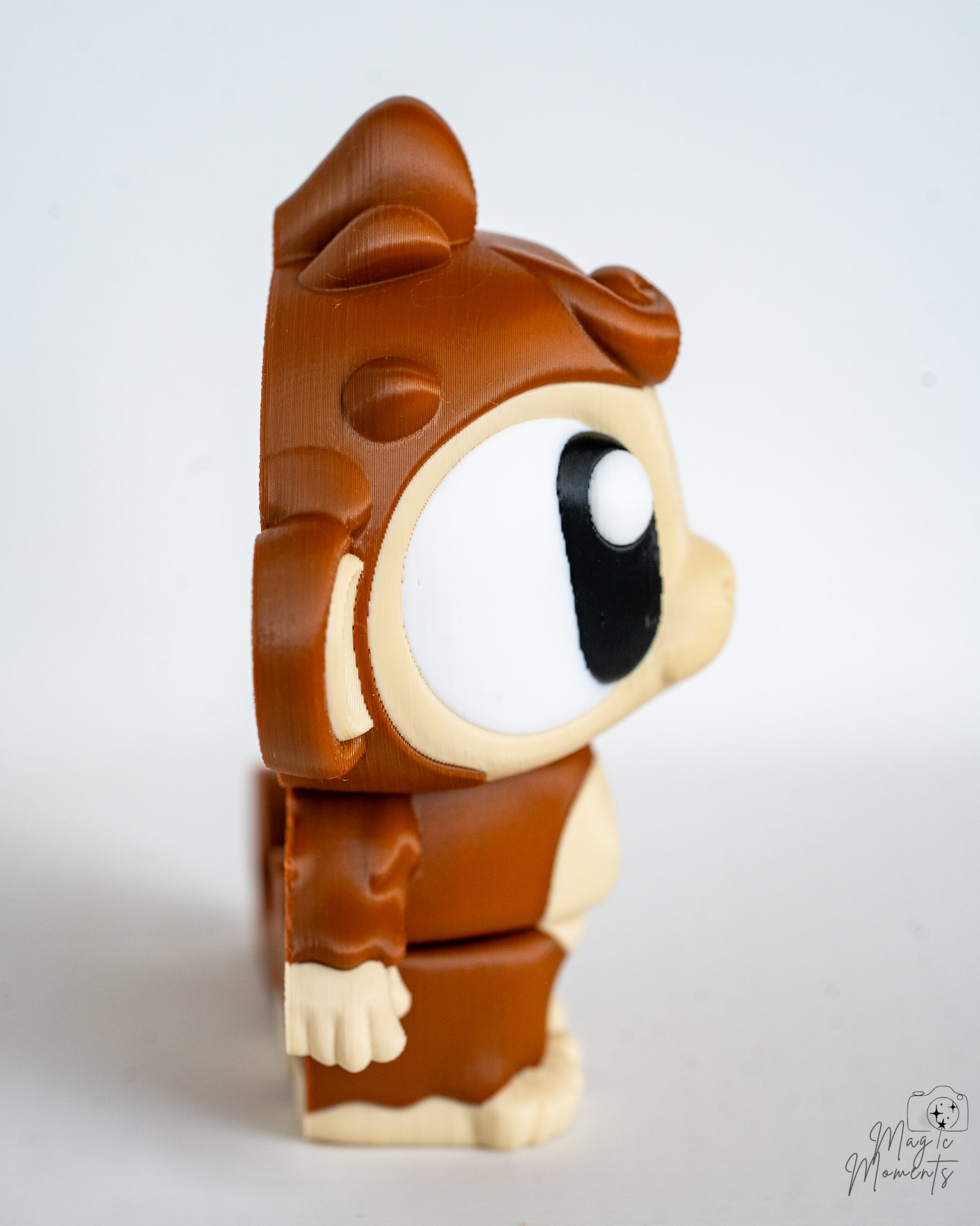 Mini monkey figurine with cartoon eyes