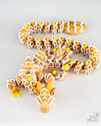 Flexible gingerbread dragon decorative piece viewed from above