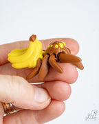 Banana spider held in hand