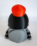 Postman pigeon figure viewed from back