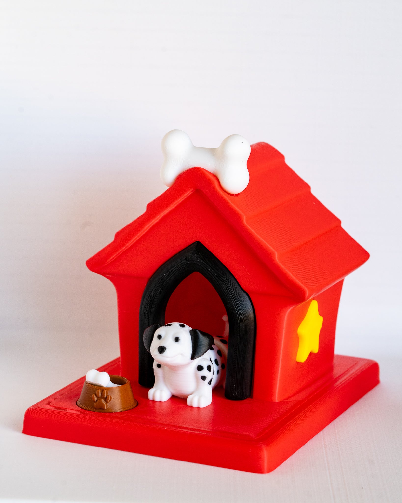 Dog house with dalmatian puppy figure inside