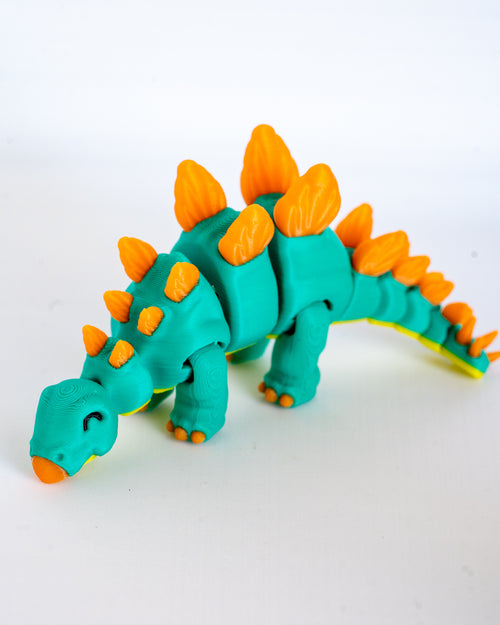 Articulated stegosaurus dinosaur figurine