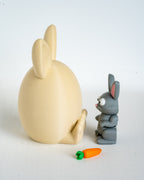 Bunny egg container with rabbit figure and carrot accessory