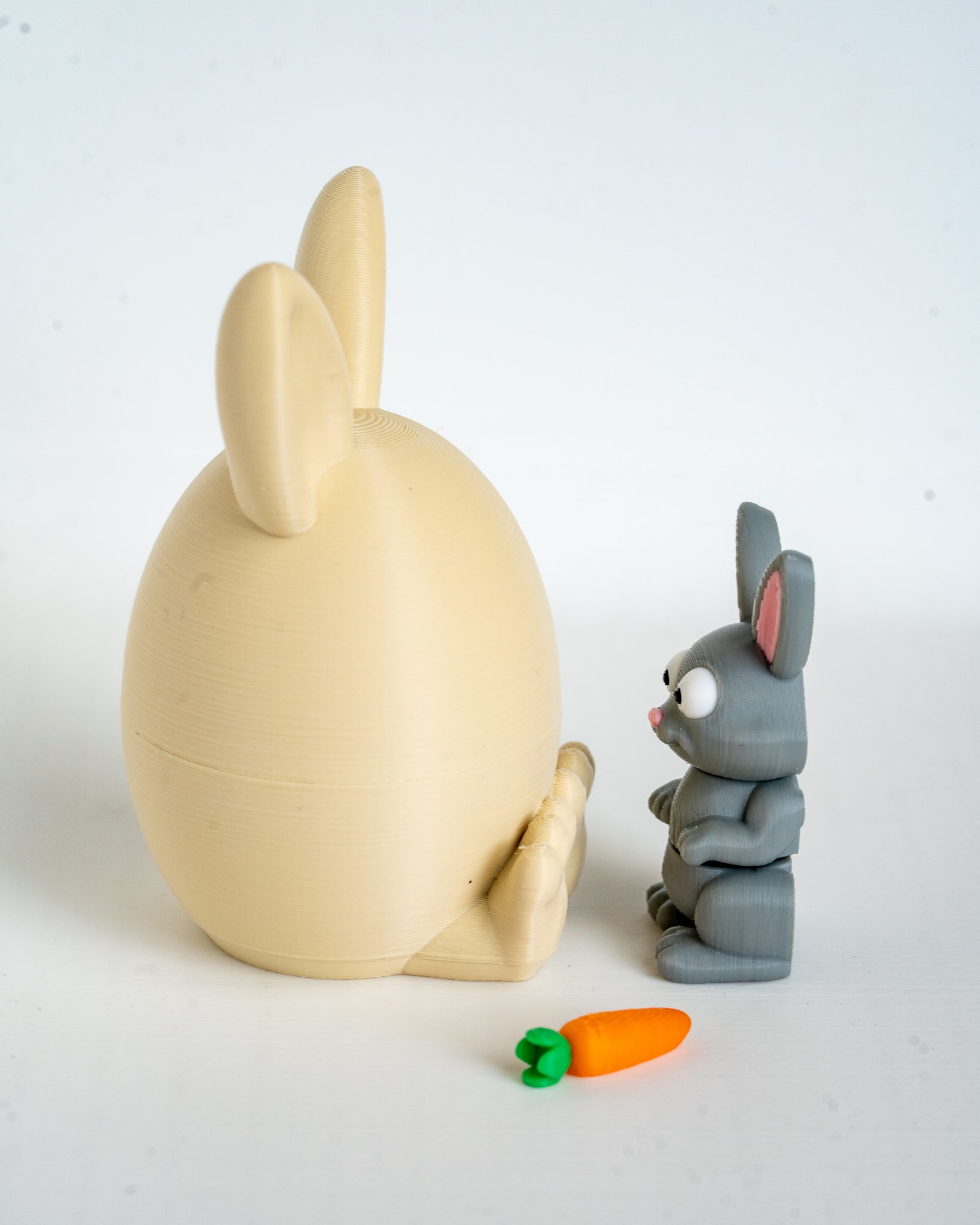 Bunny egg container with rabbit figure and carrot accessory