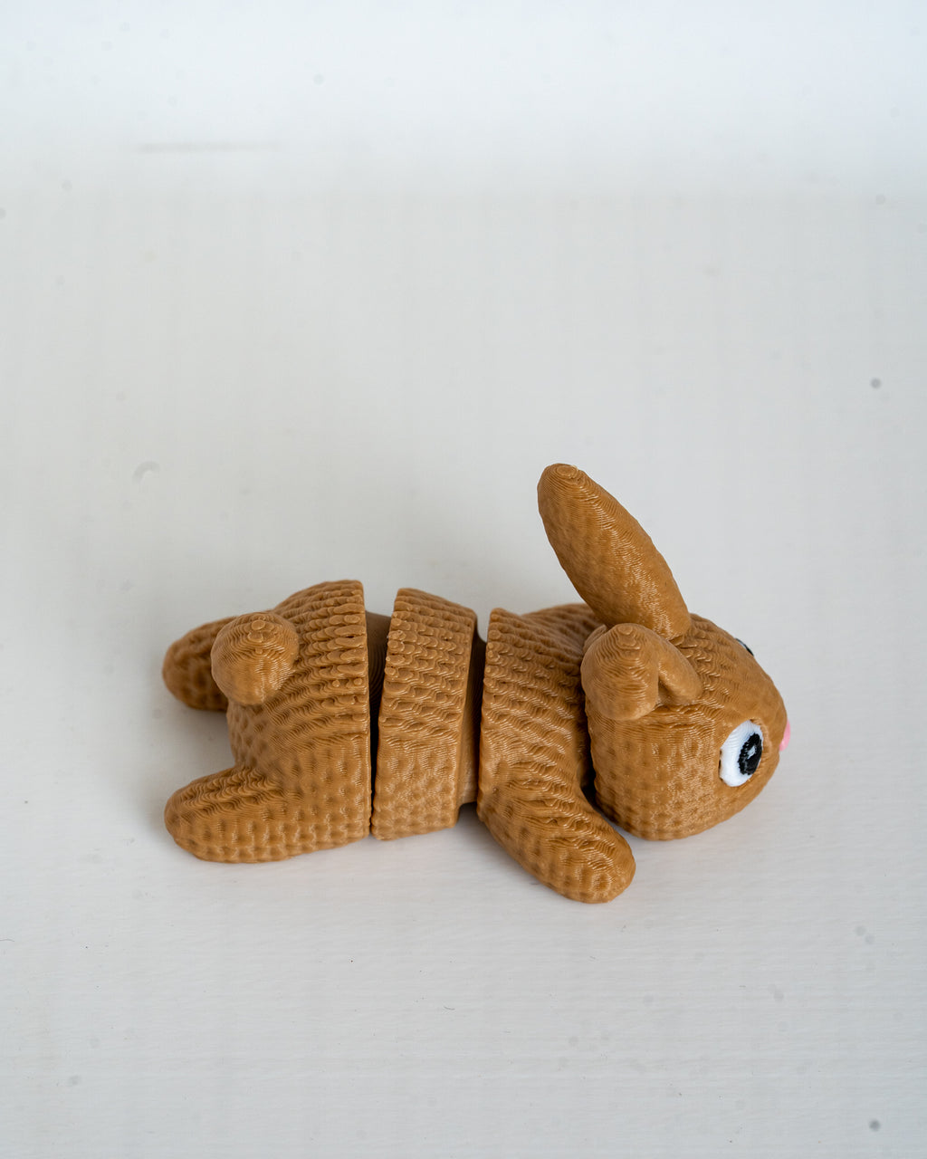 Cute bunny figure viewed from side