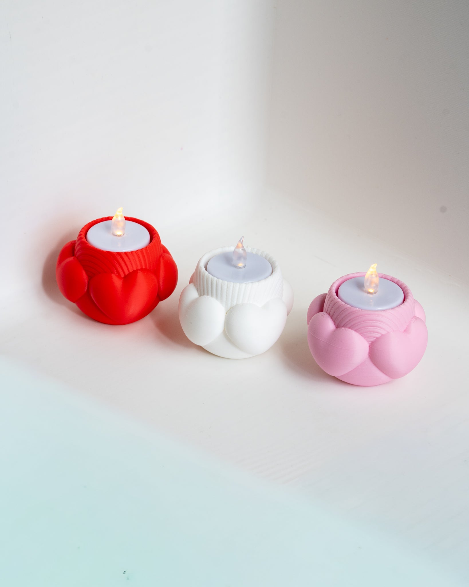 Heart shaped tealight holder set with Valentine themed designs for LED candles