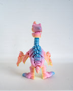 Back view of pastel pterodactyl skeleton