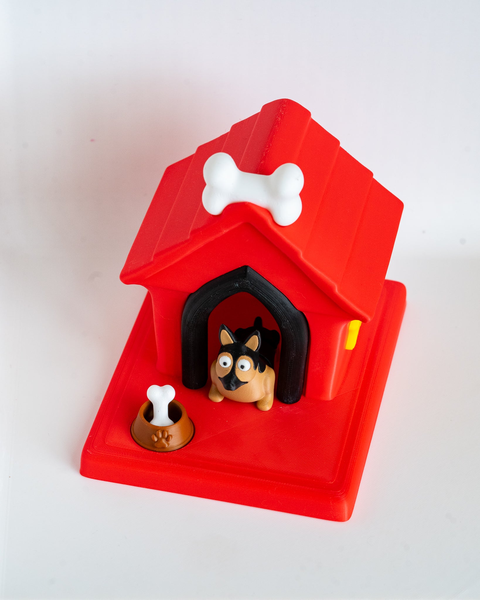 Dog house with german shepherd puppy figure inside