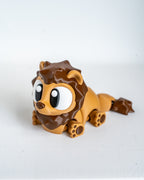 Mini lion figurine with cartoon eyes