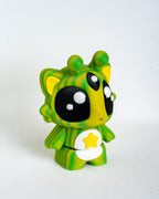 Mini alien cat figurine with cartoon eyes