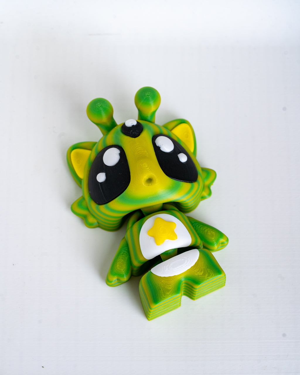 Cute alien cat decorative figure viewed from angle
