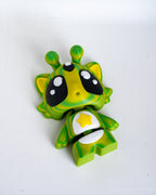 Cute alien cat decorative figure viewed from angle