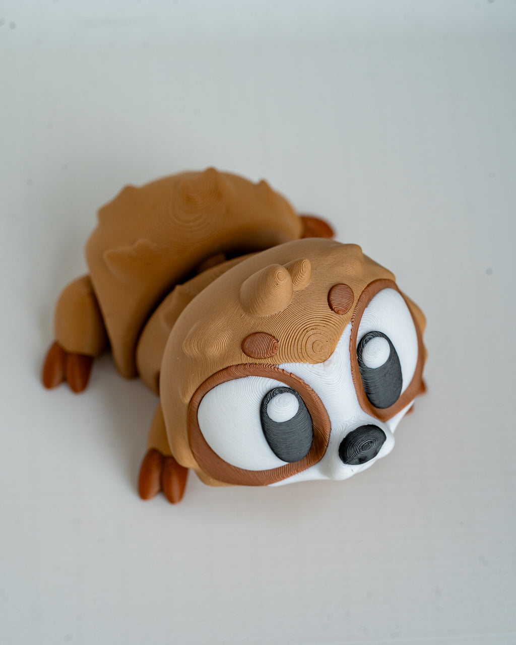 Sloth figure viewed from angle