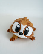 Mini sloth figurine with cartoon eyes