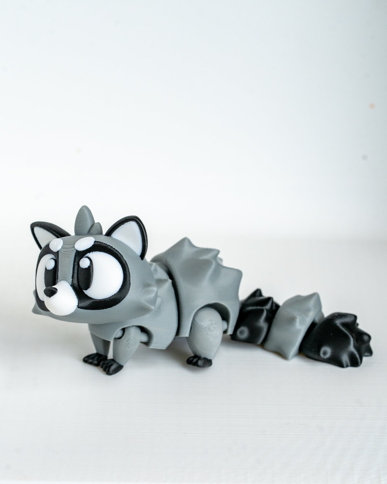 Cute raccoon decorative figure viewed from angle