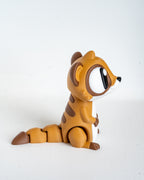 Cute meerkat decorative figure viewed from side