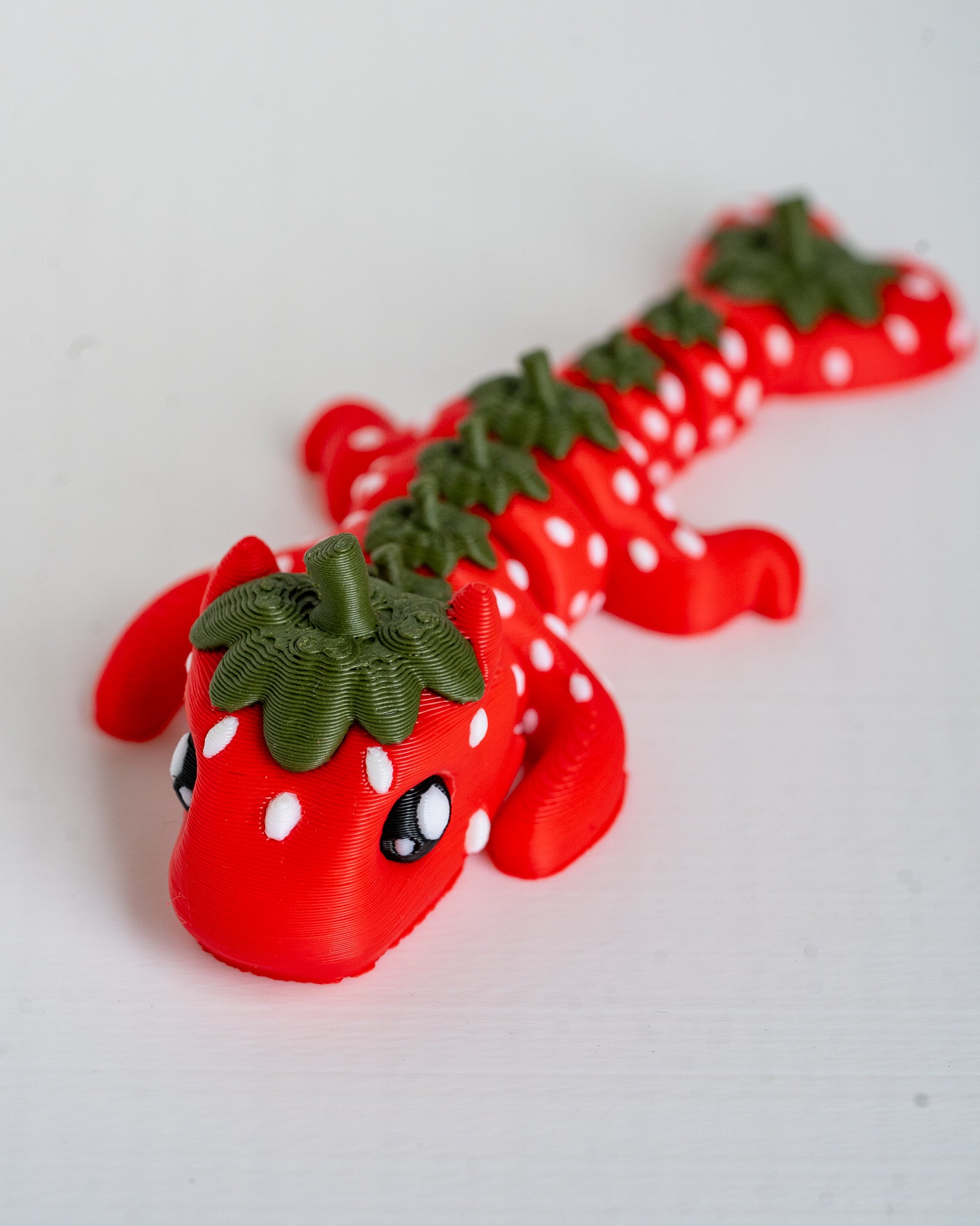 strawberry dragon figurine 3d printed articulated dragon