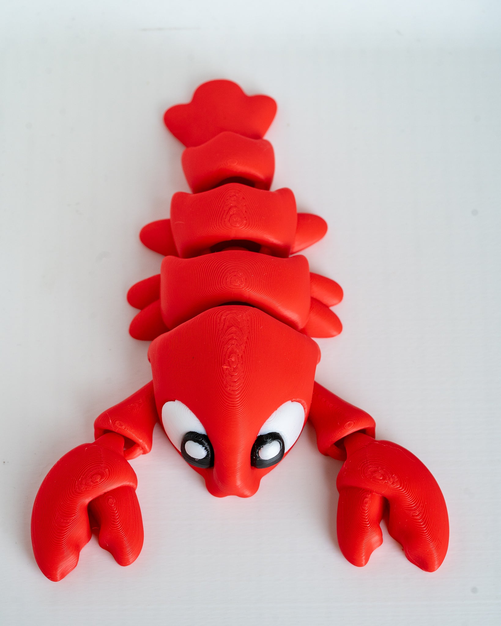 Top view of articulated lobster figure