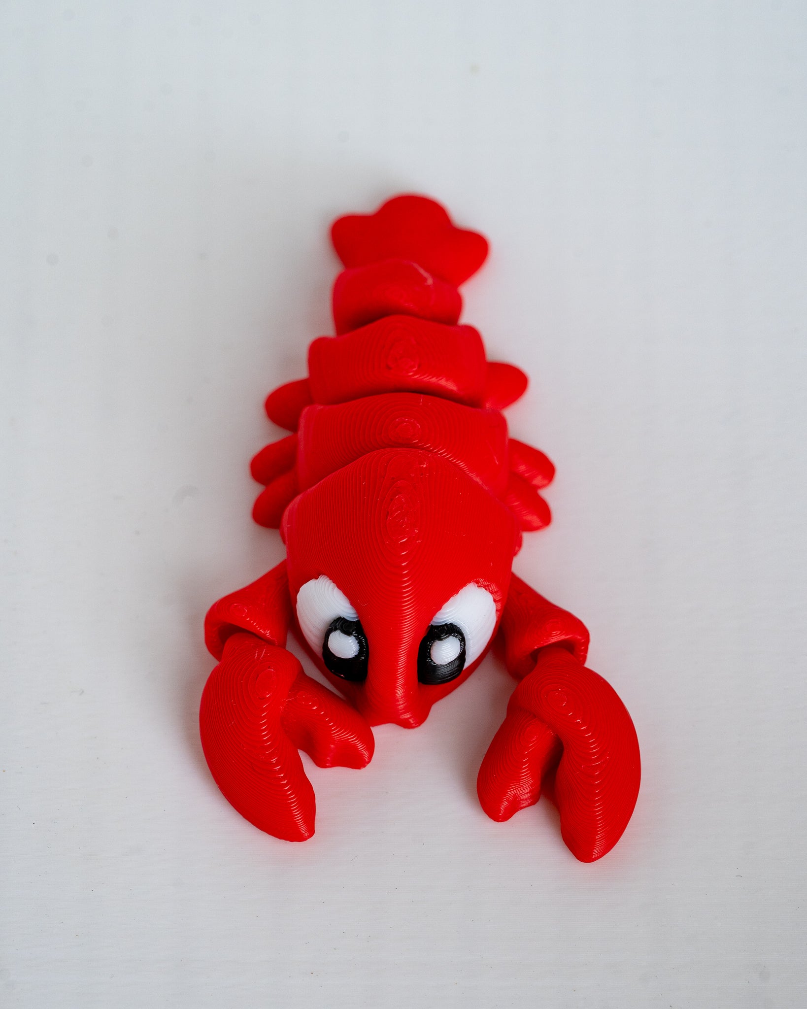 Top view of articulated lobster figure