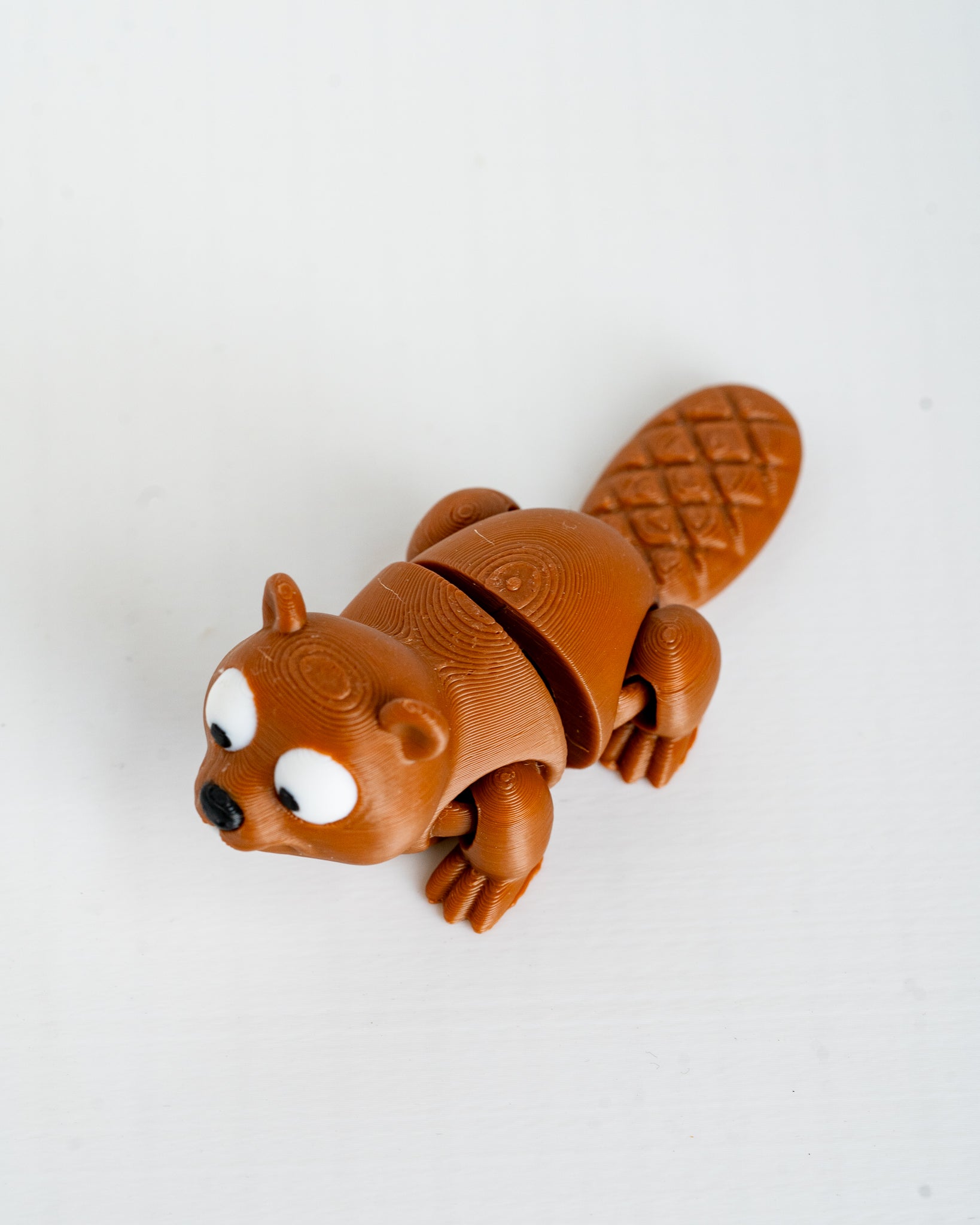 Cute beaver figure viewed from side