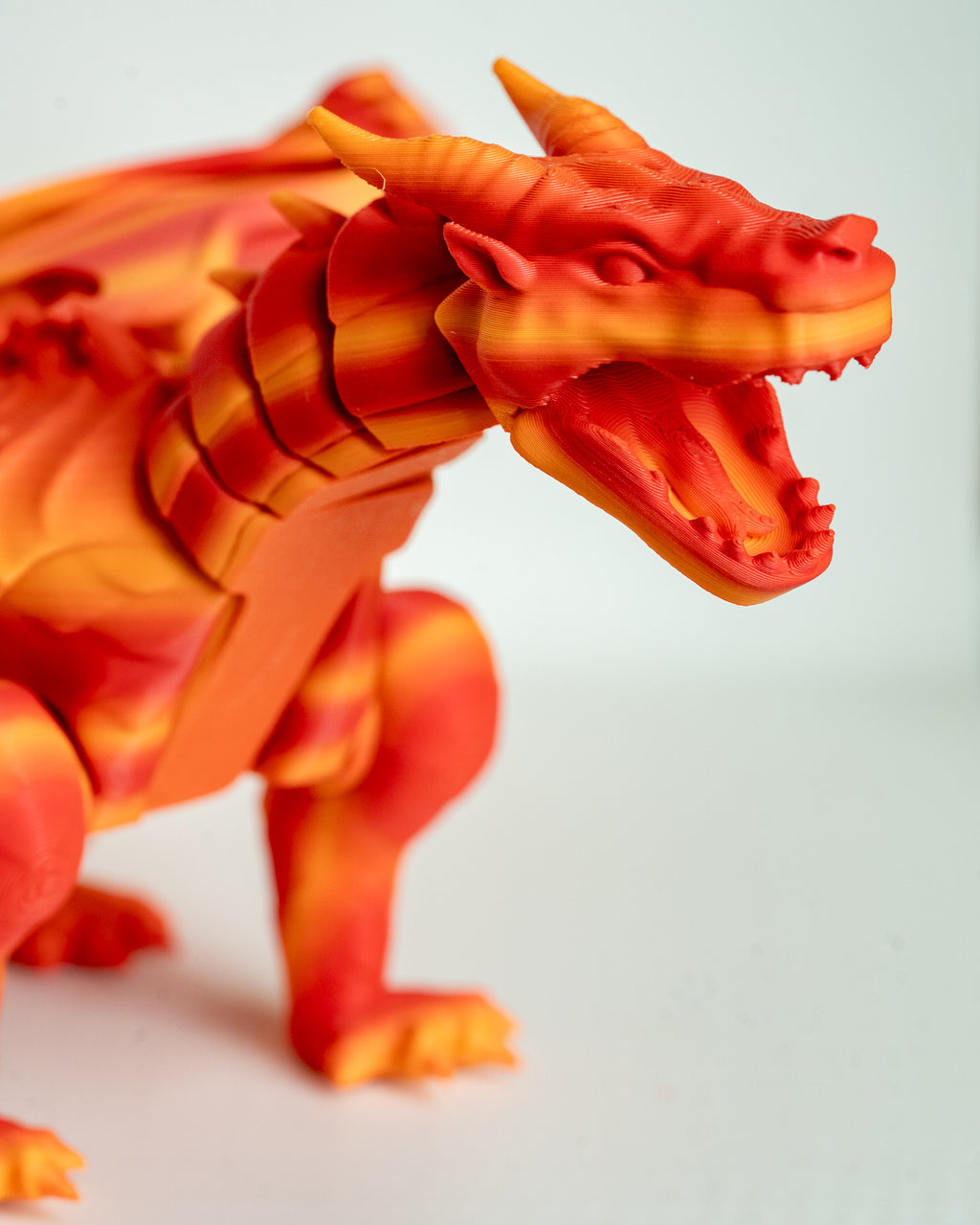 Close up of orange winged dragon head