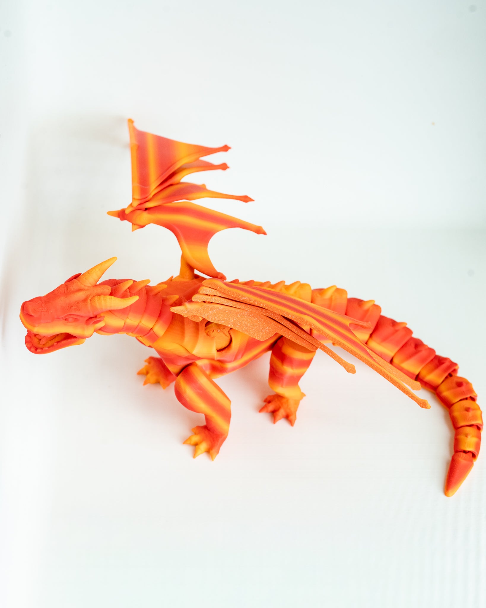 Flying orange dragon decorative figure