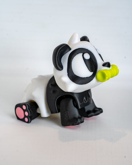 Mini panda figurine with bamboo