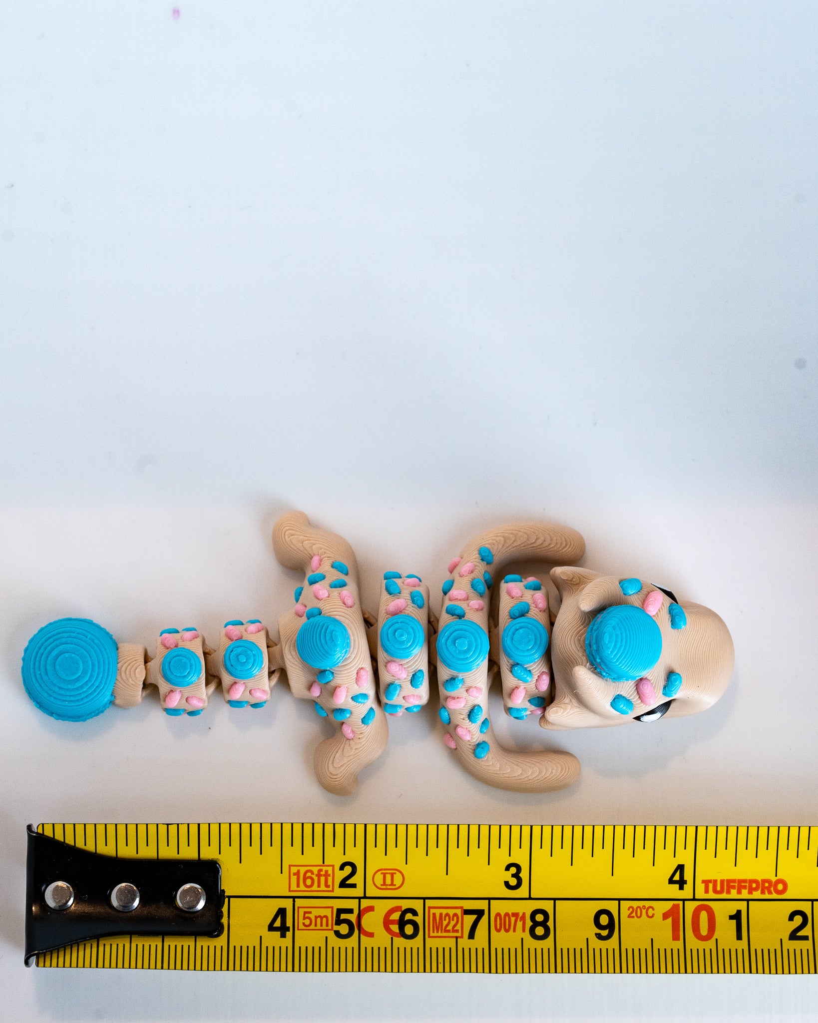 blue macaroon articulated dragon 3d printed decorative dragon with ruler