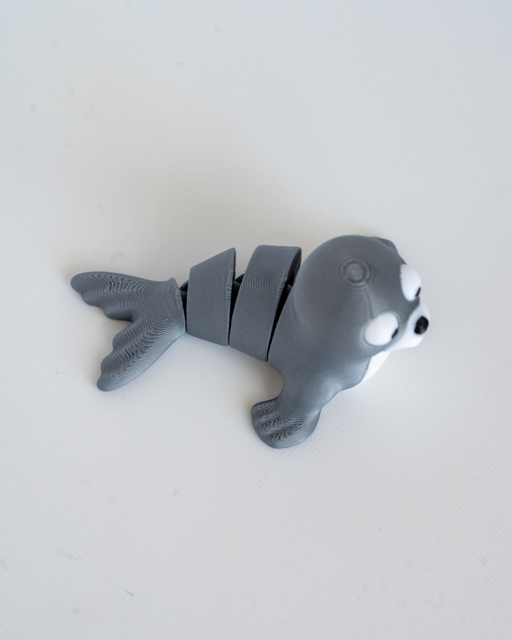 Articulated seal figure viewed from above