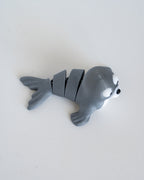 Articulated seal figure viewed from above