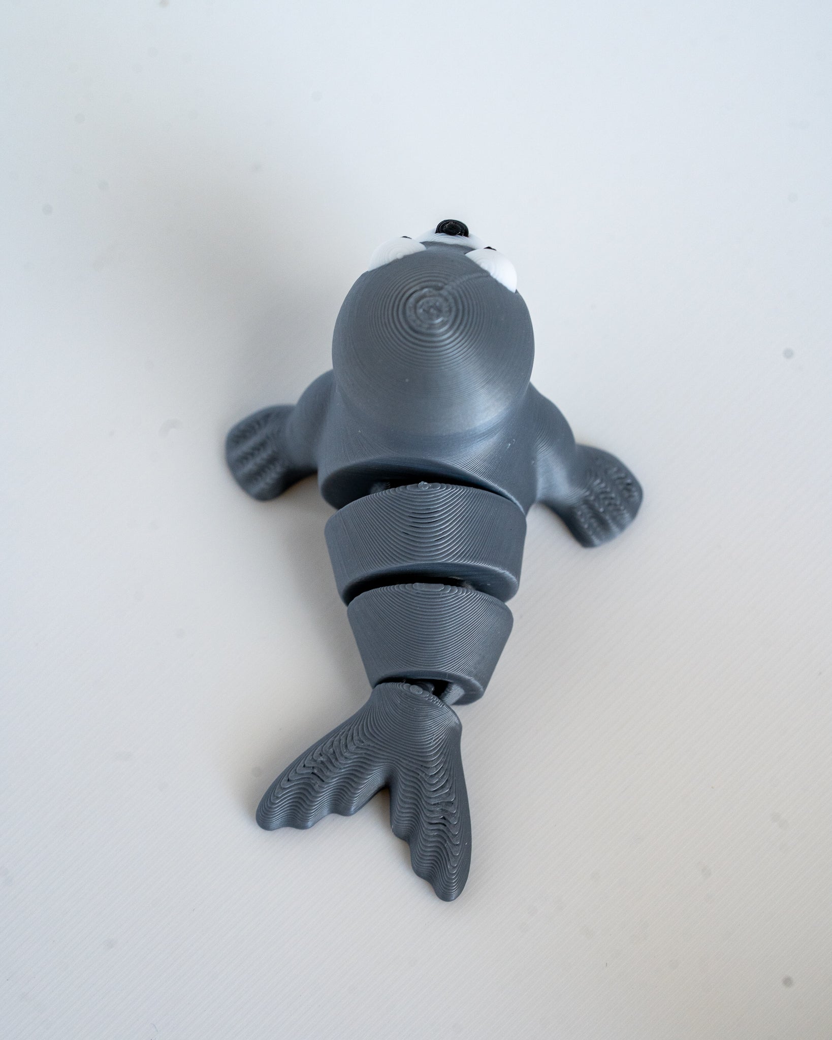 Articulated seal figure viewed from above