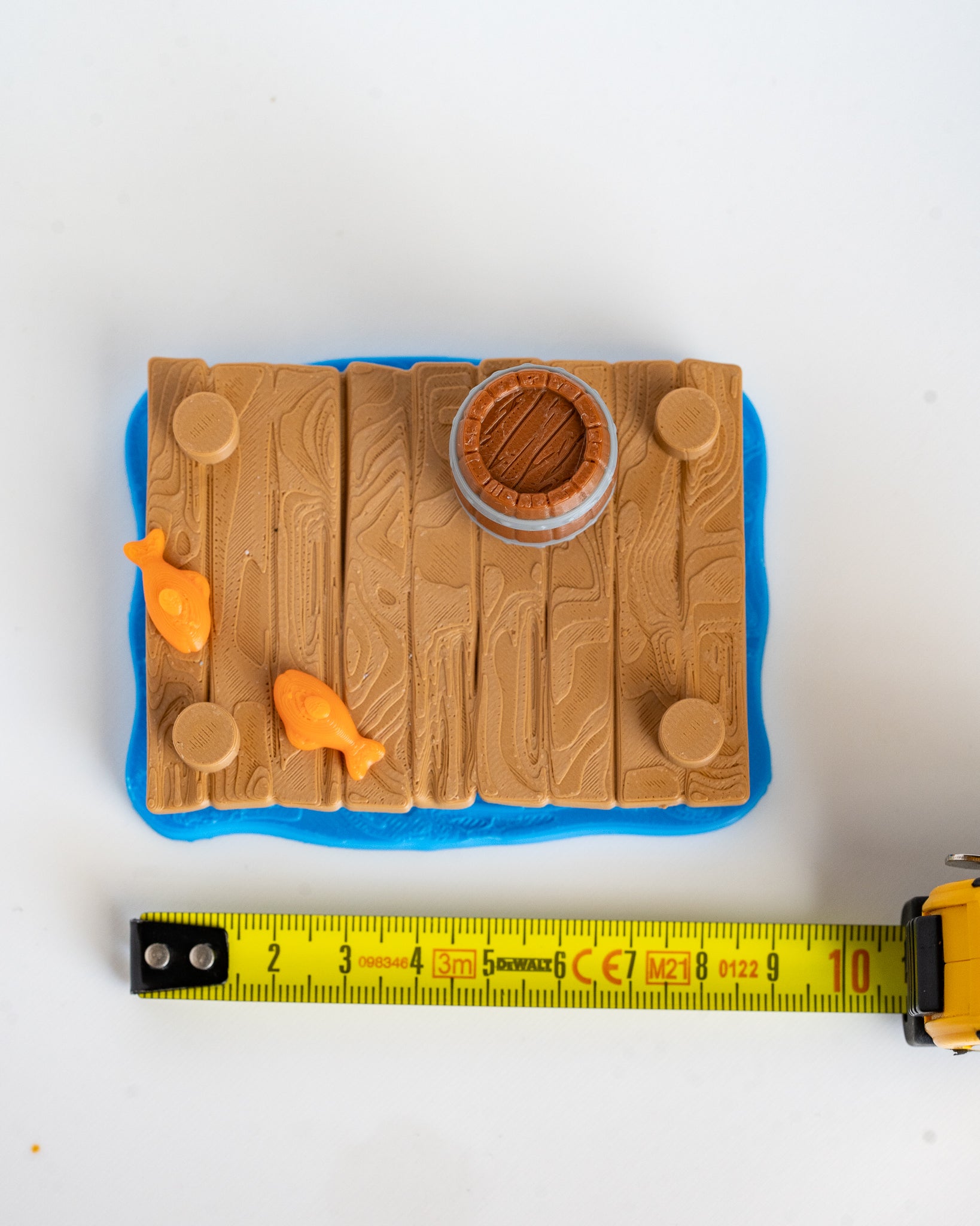 Dock display base next to measuring tape for scale